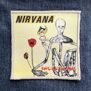 Нашивка Nirvana - Incesticide друкована біла кайма